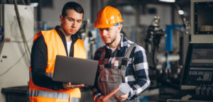 Two colleagues at a factory